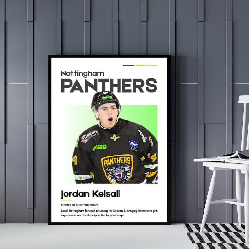 May include: A framed poster featuring Jordan Kelsall of the Nottingham Panthers hockey team. The poster has a black frame and includes the team's logo and player information. The player is wearing a black and gold jersey.