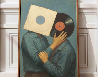 May include: A framed art print featuring two figures in denim shirts, their faces obscured by a record and its sleeve. The artwork has a vintage aesthetic, with a blue background and a wooden frame. The figures are embracing, creating a romantic and artistic scene.
