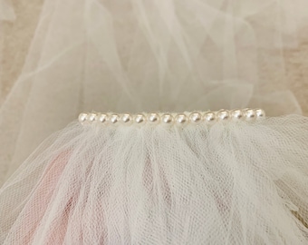 Add a single row of swarovski pearls to your veil - veil sold separately