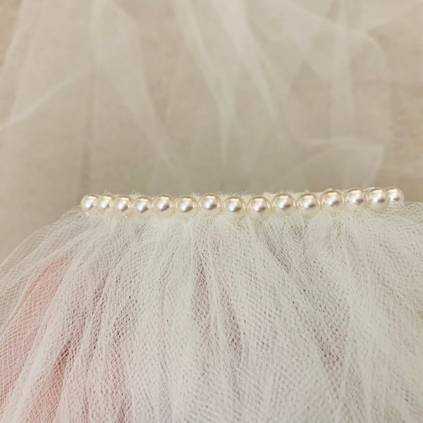 Add a single row of swarovski pearls to your veil - veil sold separately