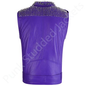 Mens purple punk leather vest with studded spiked biker design, gothic rocker sleeveless jacket style for festivals, concerts, and motorcycle riding. This heavy metal rocker vest doubles as clubwear punk biker vest and alternative style outfit. Bold purple motorcycle jacket color with gothic punk spiked details, sleeveless punk biker top cut, and rocker studded biker top finish make it perfect men’s punk festival vest and fashion statement.