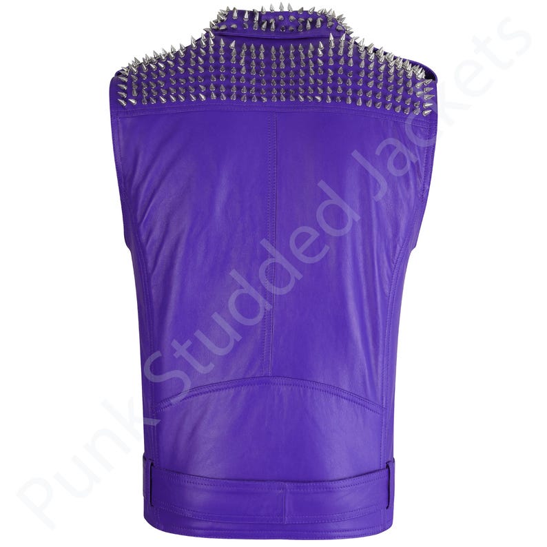 Mens purple punk leather vest with studded spiked biker design, gothic rocker sleeveless jacket style for festivals, concerts, and motorcycle riding. This heavy metal rocker vest doubles as clubwear punk biker vest and alternative style outfit. Bold purple motorcycle jacket color with gothic punk spiked details, sleeveless punk biker top cut, and rocker studded biker top finish make it perfect men’s punk festival vest and fashion statement.
