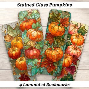 May include: Four rectangular laminated bookmarks featuring a stained glass art style with orange pumpkins and green and red autumn leaves. The text Stained Glass Pumpkins and 4 Laminated Bookmarks is visible at the top and bottom of the image.
