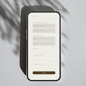 May include: A smartphone screen displaying a digital wedding RSVP form with fields for name, attendance status, plus-one information, guest name, allergies, and playlist suggestions, ending with a dark brown submit button on a light background.