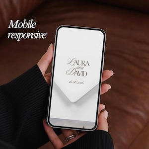 May include: A smartphone displaying a wedding invitation design. The screen shows the names "Laura and David" in elegant script, along with the date "26.08.2026". The words "Mobile responsive" are in the upper left corner.