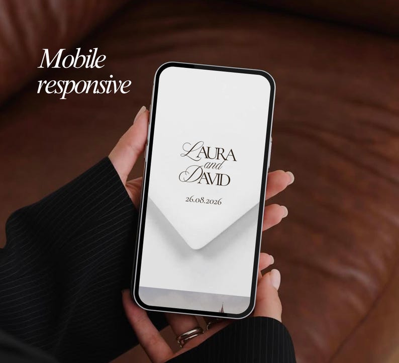 May include: A smartphone displaying a wedding invitation design. The screen shows the names "Laura and David" in elegant script, along with the date "26.08.2026". The words "Mobile responsive" are in the upper left corner.