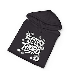 May include: Black hoodie with white text and graphics. The text reads "EVERYDAY ALL DAY THORO" with dollar signs and dice graphics. The hoodie has a drawstring hood and a front pocket.