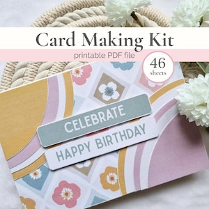 May include: Card Making Kit printable PDF file with 46 sheets. The kit includes decorative paper with floral patterns and the words "Celebrate Happy Birthday" on a light blue background. The design features pastel colors.