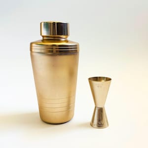 Mid Century Gold Cocktail Shaker and Jigger by Mirro