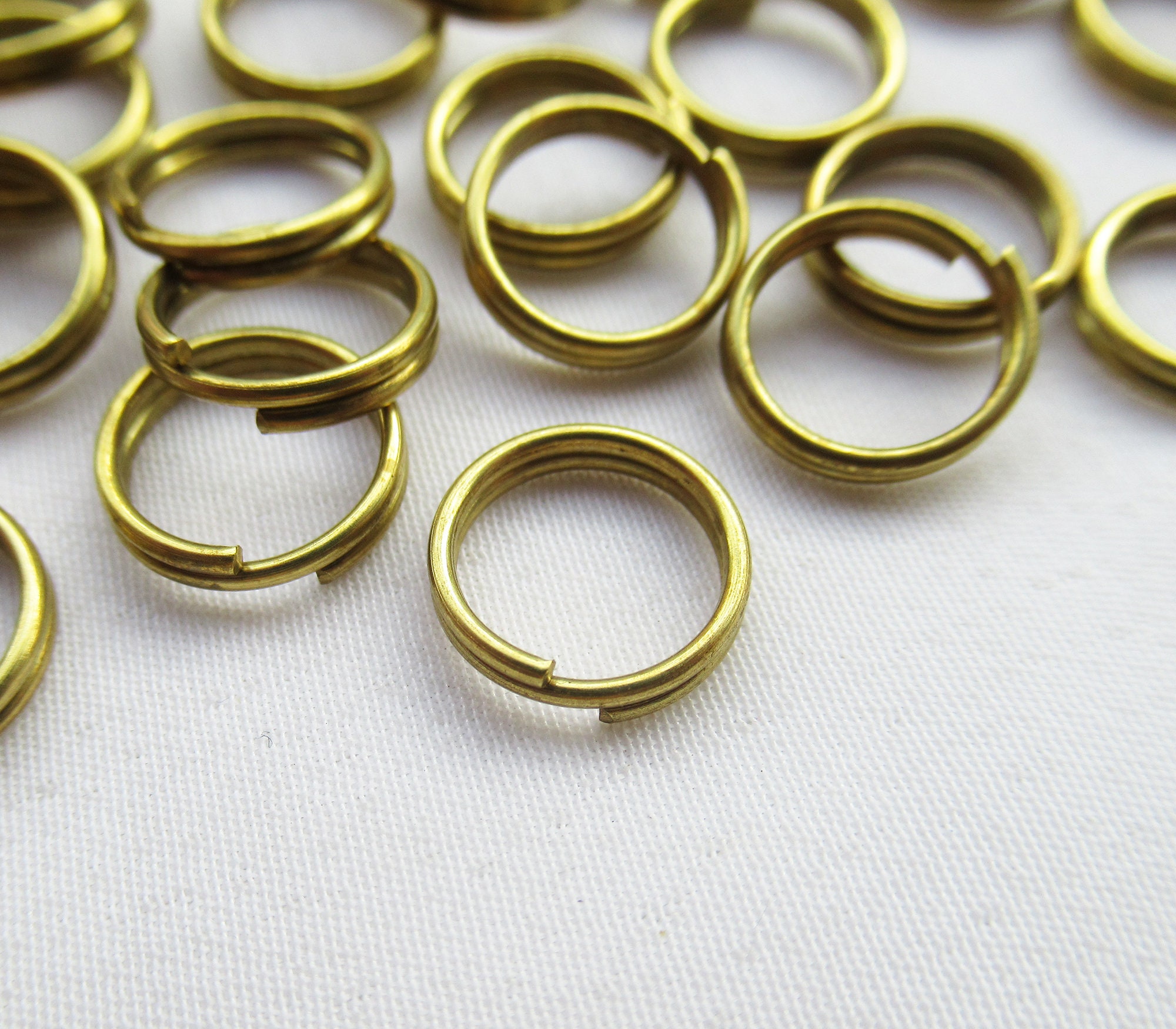 100 PCS Round solid brass large jump rings , brass open split rings –  DMleather