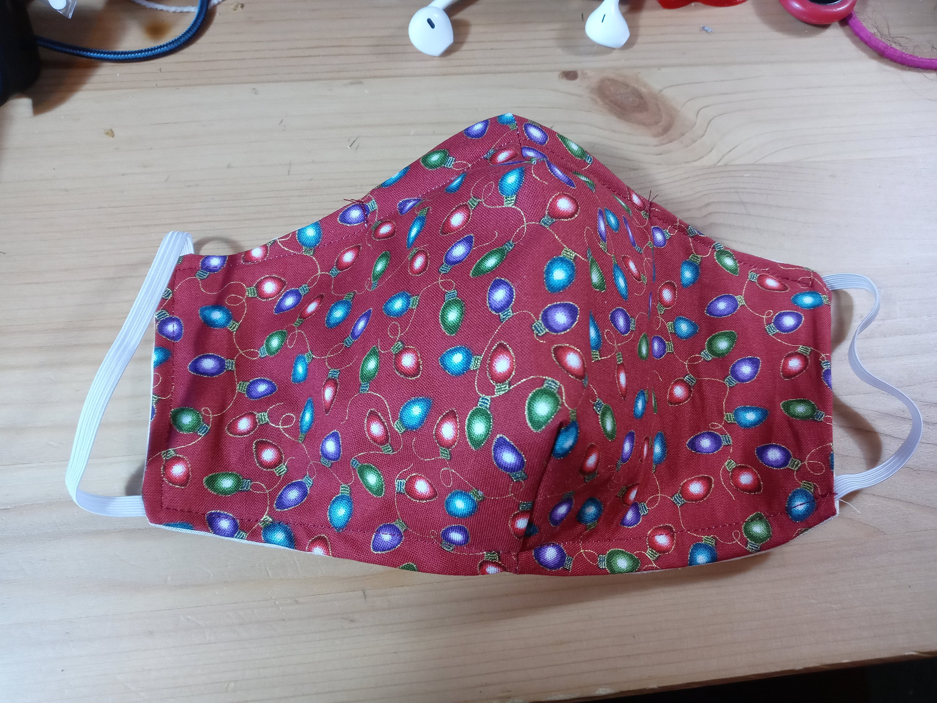 Christmas Lights Face Mask with Side Opening for Filters.  5 PM 2.5 filters included. Red, Green, Purple, Blue, Gold, and Washable.
