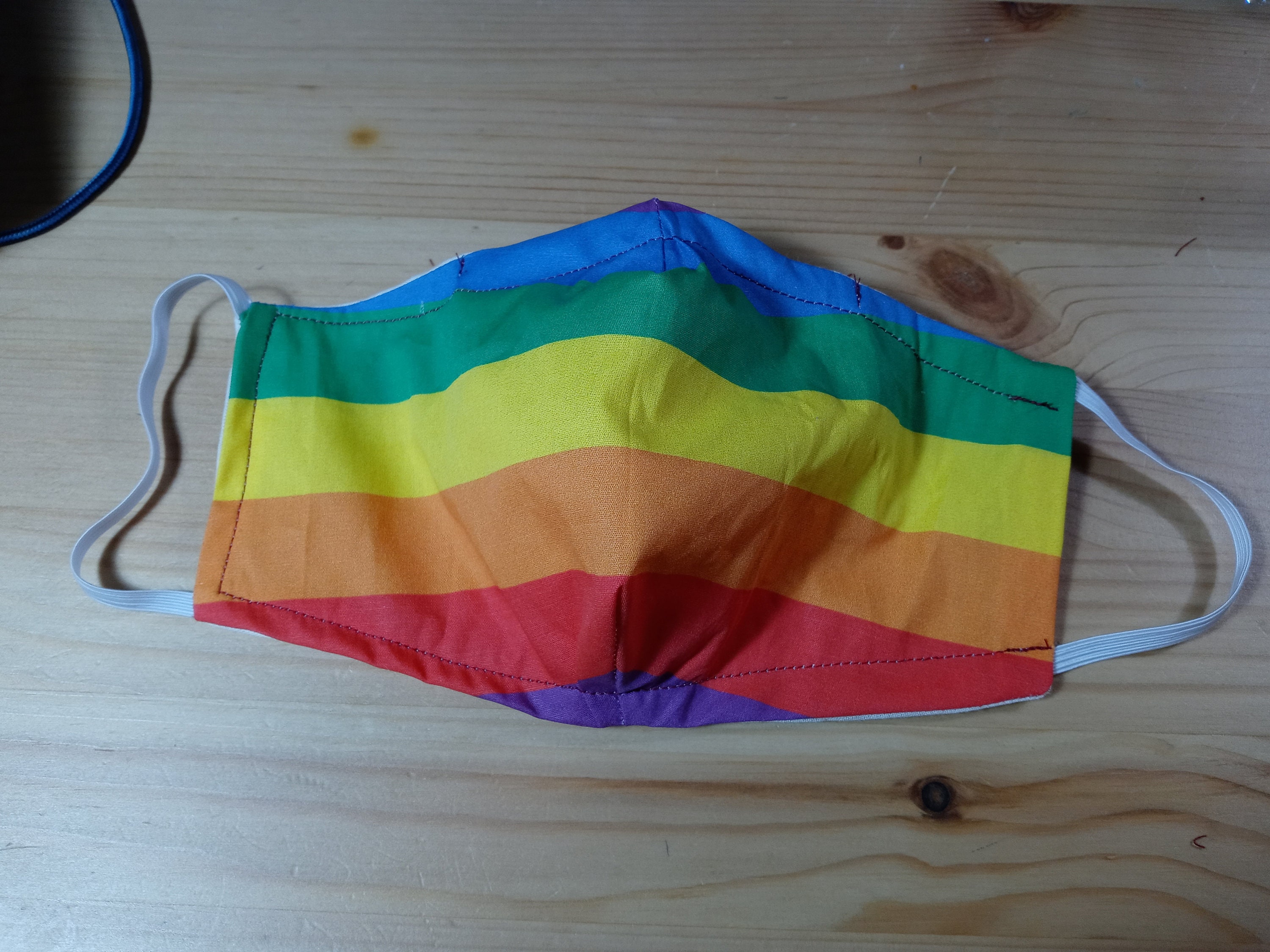 Pride Face Mask with Side Opening for Filters. This Rainbow Face Covering includes 5 PM 2.5 Filters. Washable, Adult Face Mask