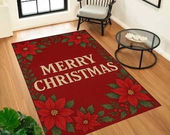 以下が含まれることがあります： 「MERRY CHRISTMAS」の文字が大きくオフホワイトで書かれた長方形の赤いクリスマスラグ。赤いポインセチアと緑の葉で飾られています。木製の床に敷かれています。