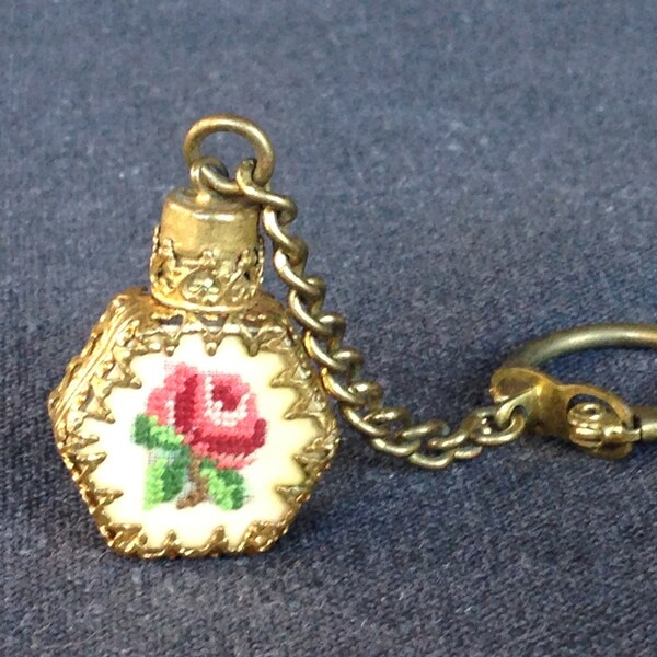 Lovely antique perfume vial keychain. Precious carry on souvenir keyring cross stitch container.