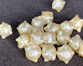 Pearly glass spiked beads set of 8. Pretty jewelry making retro supply.