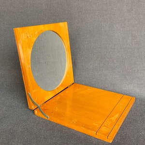 Vintage magnifying folding travel mirror. Traveller foldable portable material.