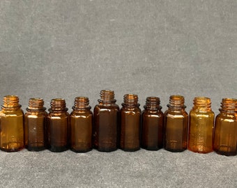 External use only. Vintage French vials for magical potion. Rescued laboratory supply from France. Amber glass bottles for home decoration