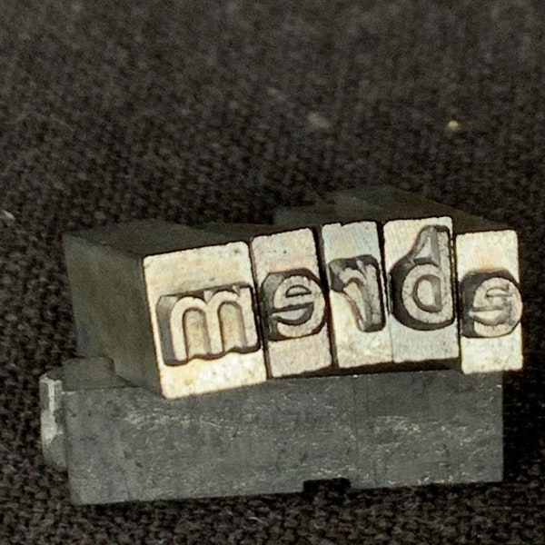 MERDE. Vintage FRENCH letterpress printing blocks word spelling SHIT. Printer retro supply. Mixed media and shadow box fun supply findings.