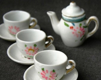 Miniature antique tiny porcelain tea set. Dollhouse collectible ceramic flowery cups. Shadow box mini home decor.