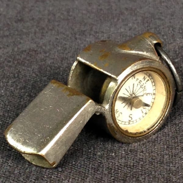 Antique whistle with a built-in compass. Vintage militaria collectibles ooak find for collectors. Never lose your way again.