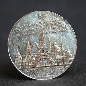 French commemorative souvenir from the Eiffel Tower in Paris. 1889 antique landmark memorabilia silvery medal. France 19th century vacations image 1