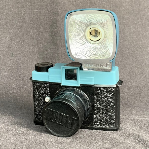 Vintage retro Diana-F flash camera. Photographer collectible supply tool. Film 120 photography collector material. Taking picture fun.