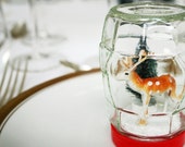 Vintage style handmade diorama snow globe. Waterless winter scene.