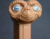 E. T. Pez candy dispenser.