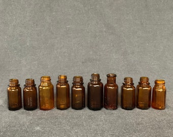 External use only. Vintage French vials for magical potion. Rescued laboratory supply from France. Amber glass bottles for home decoration