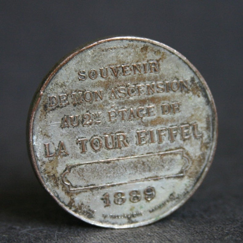 French commemorative souvenir from the Eiffel Tower in Paris. 1889 antique landmark memorabilia silvery medal. France 19th century vacations image 2