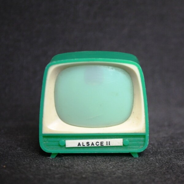 What is on telly tonight. Vintage toy TV viewer souvenir from Alsace, France.