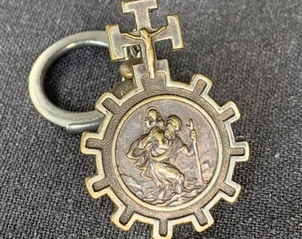 Saint Christophe will protect you. French catholic religious souvenir medal with warning message in case of death. Last will retro pendant