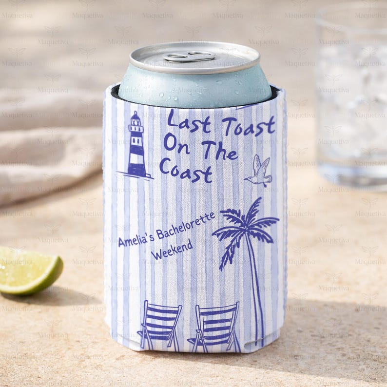 May include: A blue and white striped can cooler with the text "Last Toast On The Coast" and "Amelia's Bachelorette Weekend". The design includes a lighthouse, palm tree, bird, and beach chairs. A light blue can is inside the cooler.