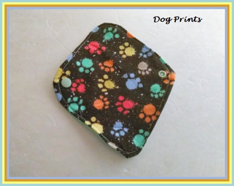 Elija su comodidad: protectores diarios de tela lavables Dog Prints