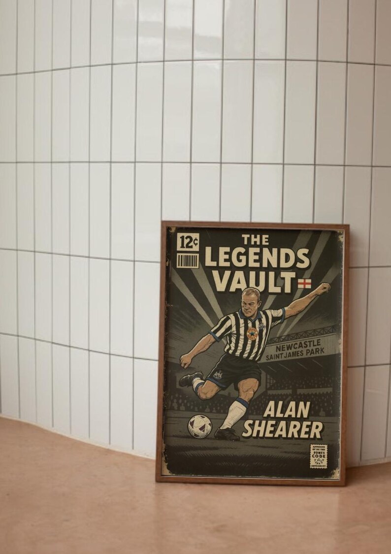 May include: Framed vintage-style print featuring a soccer player in a black and white striped uniform kicking a ball. The print reads "The Legends Vault" and "Alan Shearer" with "Newcastle Saint James Park" text.