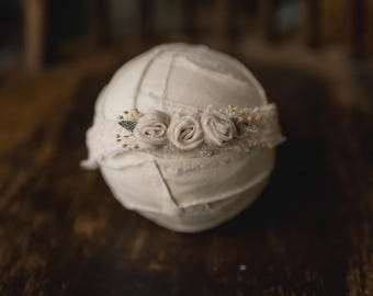 Cream rolled flower stretch headband