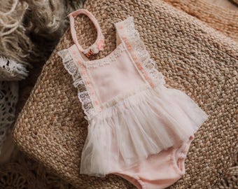 Sitter. Peachy pink and lace dress set
