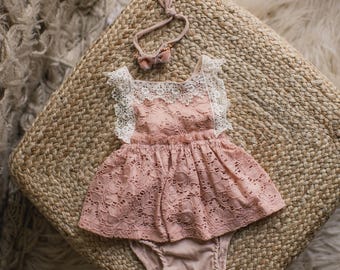 Sitter.  Pink and lace dress set