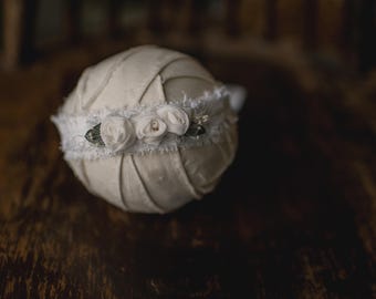 White rolled flower stretch headband