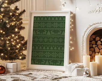 May include: A framed print with a green background and a repeating pattern of snowflakes, trees, and reindeer. The print is in a white frame and is displayed on a fluffy, white rug. A Christmas tree and fireplace are in the background.