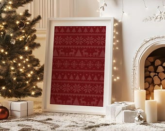May include: A framed print with a red and white Nordic pattern featuring reindeer, snowflakes, and trees. The print is displayed in a white frame, set against a festive Christmas scene with a decorated tree and fireplace.