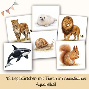 May include: A collection of animal illustrations on white cards, including a leopard, seal, lion, snail, orca, and squirrel. The cards are arranged together, with text at the bottom that reads "48 Legerk&auml;rtchen mit Tieren im realistischen Aquarellstil."