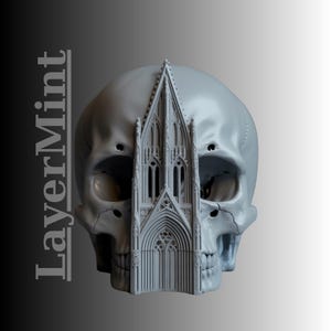 May include: A grey skull sculpture featuring a gothic cathedral design integrated into the skull's structure. The sculpture has a detailed architectural facade. The text "LayerMint" is vertically aligned on the left side of the image.