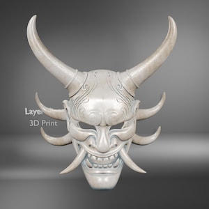 May include: A detailed, off-white Oni mask with large, curved horns and multiple smaller horns. The mask features a wide grin with visible teeth and long tusks. Intricate patterns adorn the forehead area. The text "Layer" and "3D Print" is visible on the left side.