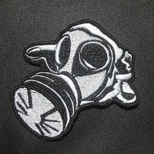 May include: A set of three ceramic mugs with a speckled, matte finish. The mugs are in shades of cream, light gray, and dark gray. Each mug has a simple, minimalist design, perfect for coffee or tea.