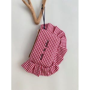 Bolso de mano estampado, volante, bordado a mano