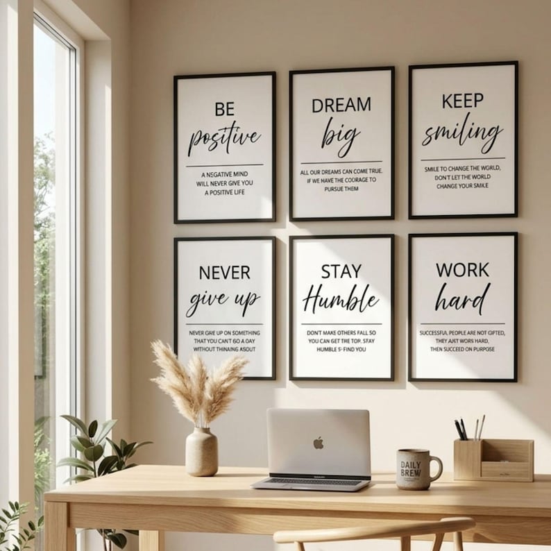 May include: Six rectangular wall art prints in black frames, each featuring white backgrounds with black typography. The prints display motivational phrases including Be Positive, Dream Big, Keep Smiling, Never Give Up, Stay Humble, and Work Hard.