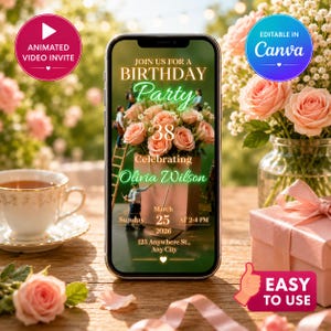 Op de afbeelding: Een smartphone toont een verjaardagsfeestuitnodiging met een bloemstuk en de tekst "Doe met ons mee voor een verjaardagsfeest". De uitnodiging bevat de naam "Olivia Wilson", datum, tijd en adres. Andere elementen zijn een theekopje, rozen en een geschenkdoos.