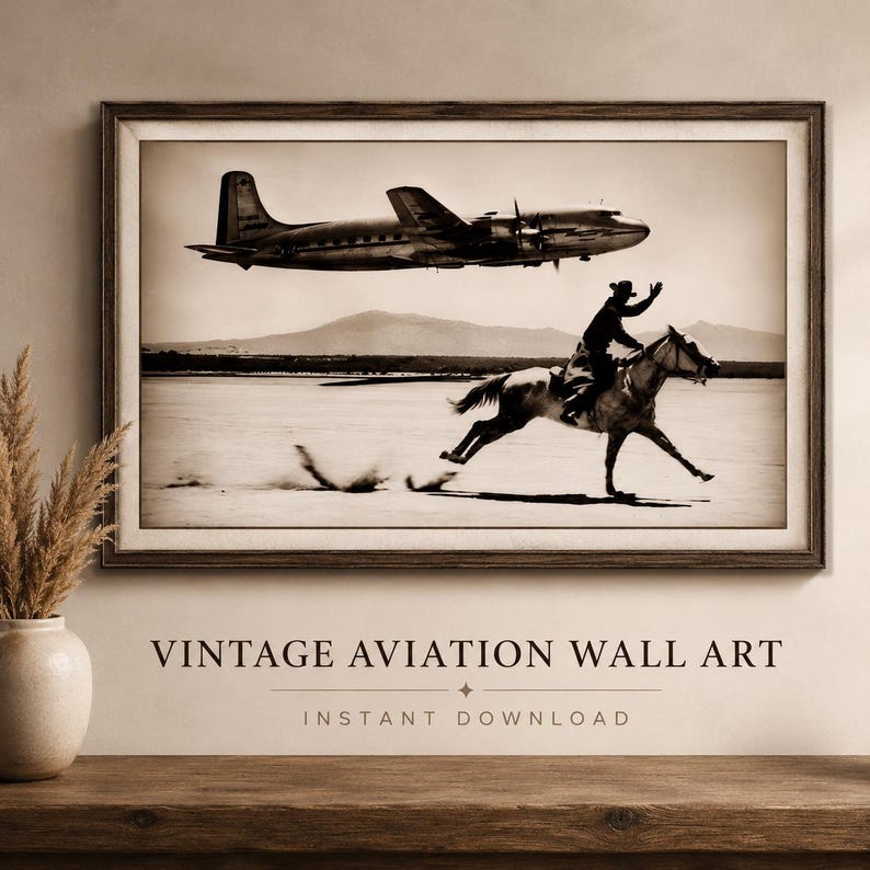 May include: A framed sepia-toned wall art print featuring a vintage propeller airplane flying low over a desert landscape while a person rides a horse at a gallop in the foreground. The image captures a contrast between aviation and equestrian travel.