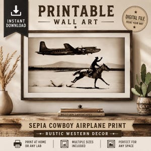 May include: A sepia-toned wall art print in a dark wooden frame featuring a vintage airplane flying over a cowboy riding a horse. The text reads PRINTABLE WALL ART, DIGITAL FILE, WESTERN LANDSCAPES, and SEPIA COWBOY AIRPLANE PRINT RUSTIC WESTERN DECOR.